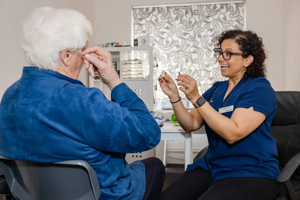 Hearing aids placed in a charging case