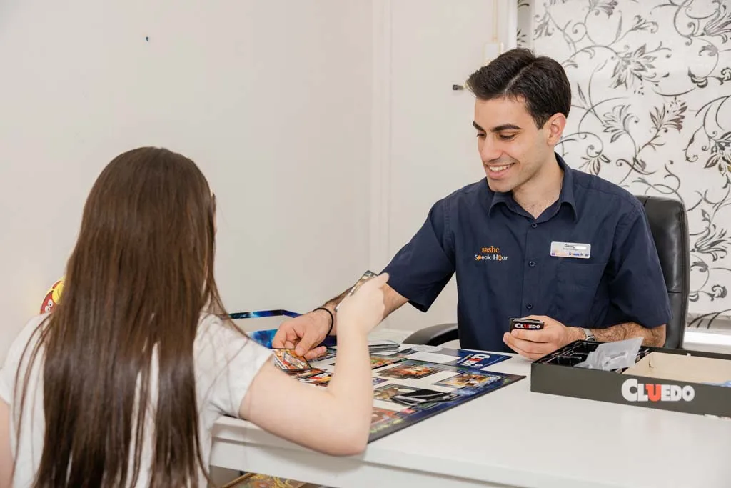 Independent audiologist consulting with a patient about hearing aids
