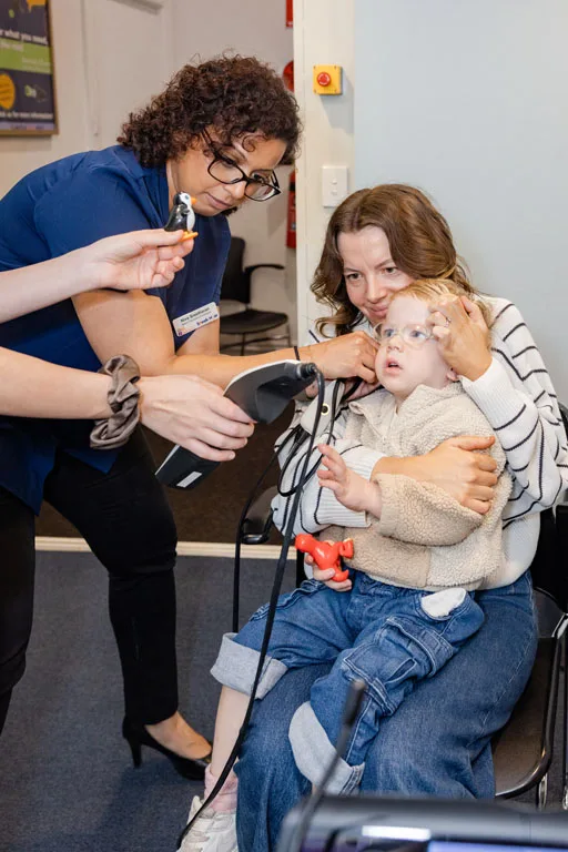 A child undergoing a tympanometry test at South Australia Speech and Hearing Centre