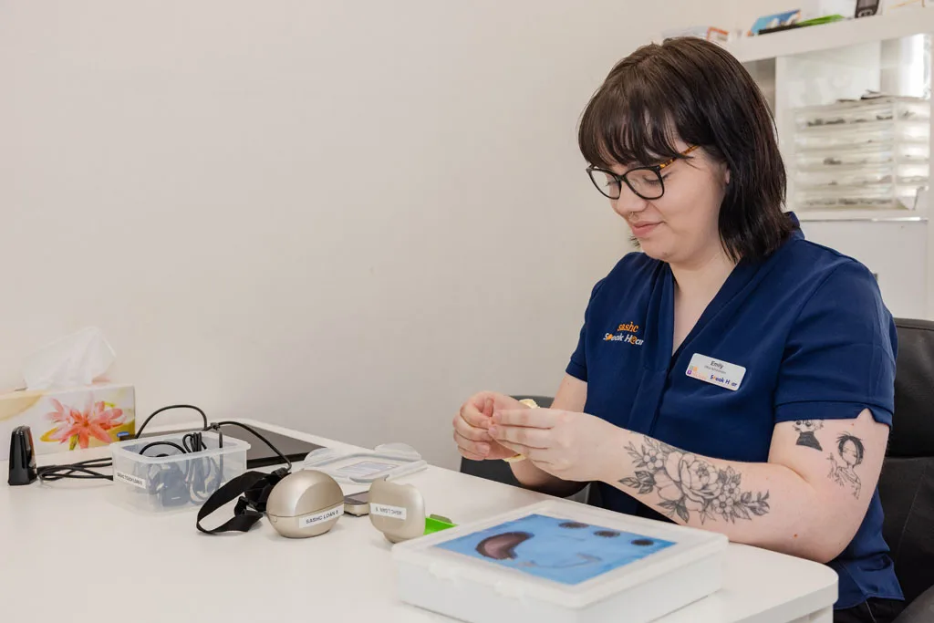 Digital hearing aids with advanced noise reduction.