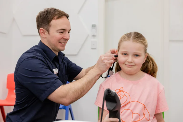 A child undergoing a tympanometry test at South Australia Speech and Hearing Centre